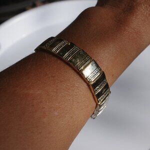 Women`s gold tone bracelet.